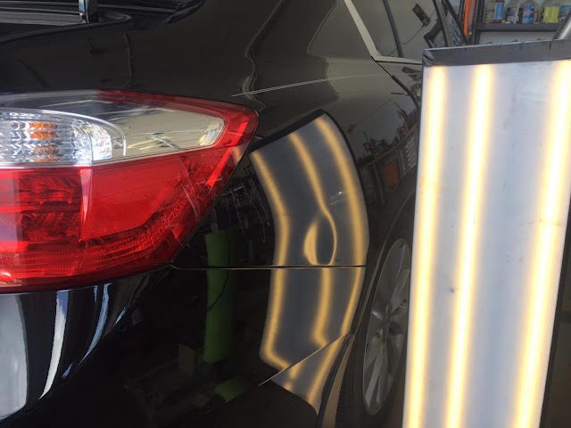 Carsmetic Paintless Dent Repair Door Ding Removal photo 2