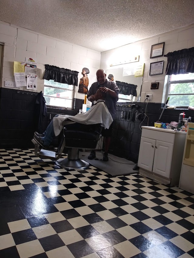 Herman's Cut & Style Shop Inc photo 2