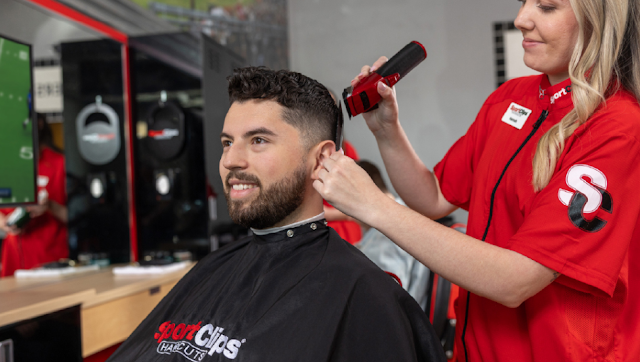Sport Clips Haircuts of River City photo 4